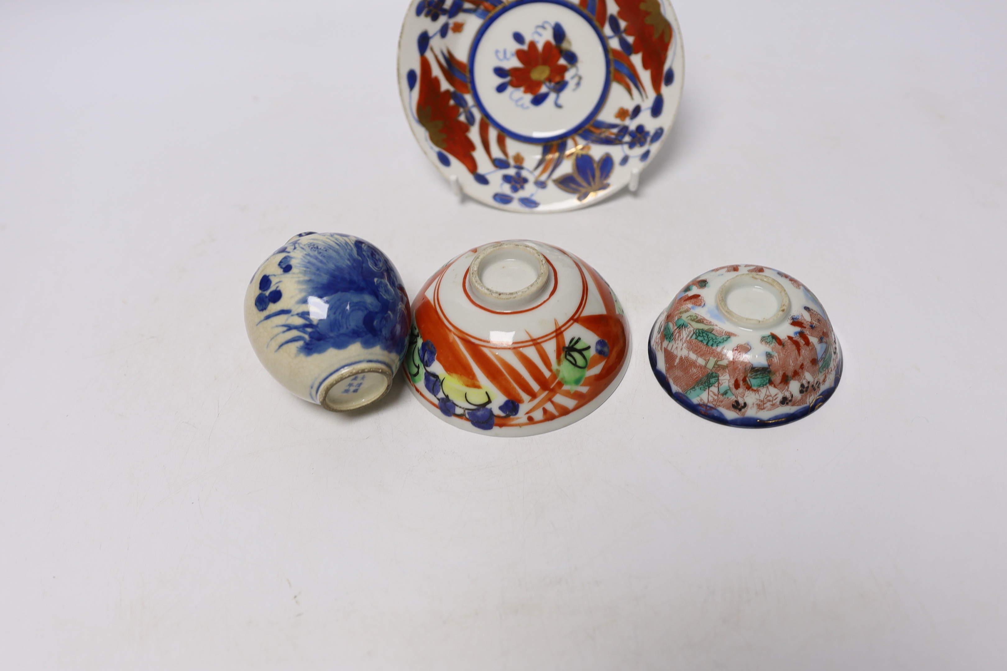 A Chinese soft paste porcelain miniature vase, two small bowls, and a small dish, vase 7cm (4)